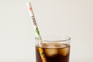 Cold drink with tropical themed paper straw.